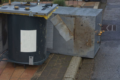 High angle view of machine on sidewalk