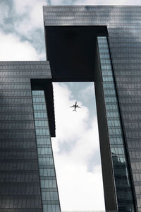 Low angle view of skyscrapers against sky