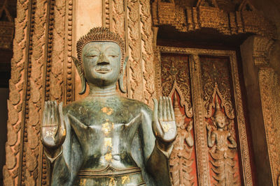 Statue of historic building at temple