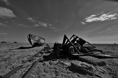 Broken and rusted machinery on beach