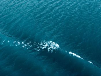 High angle view of waves in sea 