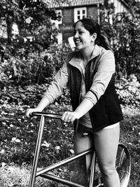 Smiling young woman looking away outdoors