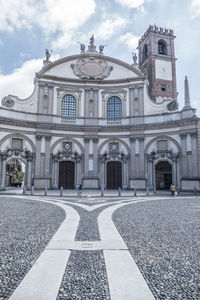 Facade of historic building against sky