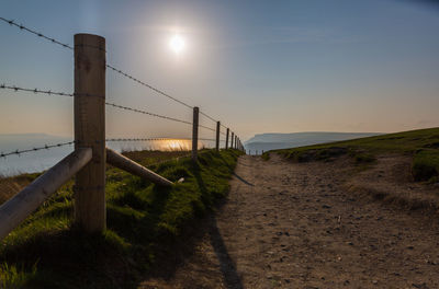 Scenic view of landscape at sunset