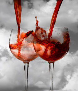 Close-up of red wine in glass on table