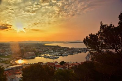 Scenic view of sea against sky at sunset