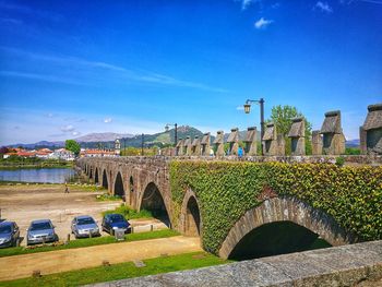 Arch bridge against blue sky