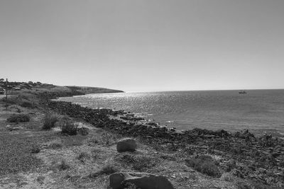 Scenic view of sea against clear sky