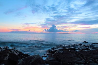 Scenic view of sea against sky during sunset