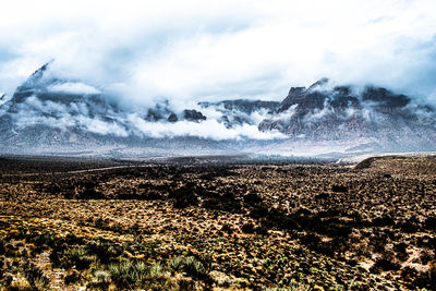Scenic view of land against sky