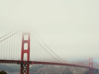 View of suspension bridge against sky