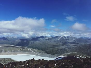 Scenic view of mountains against sky during winter