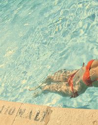 Low section of woman on beach