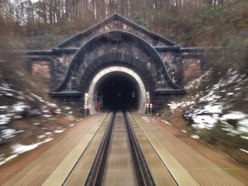 Railroad tracks in tunnel