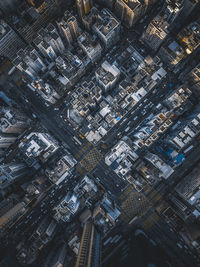 Aerial view of illuminated buildings in city at night