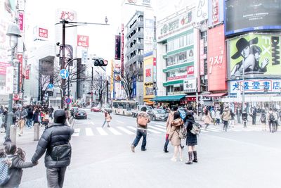 People walking on city street