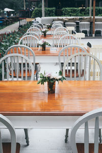 Empty chairs and table in restaurant