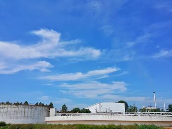 Low angle view of building against blue sky