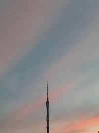 Low angle view of tower against sky during sunset