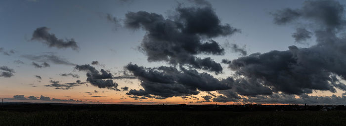 Scenic view of silhouette landscape against sky during sunset