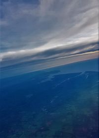 Scenic view of sea against blue sky