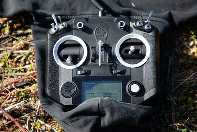 High angle view of remote control on field