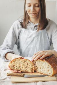 Midsection of woman having food