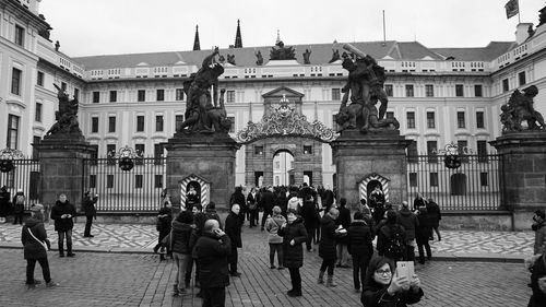 Tourists in front of building