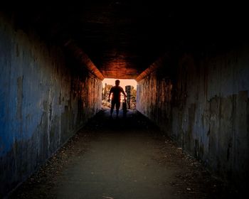 People walking in tunnel