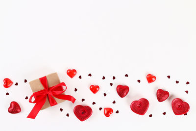 Close-up of christmas decorations over white background