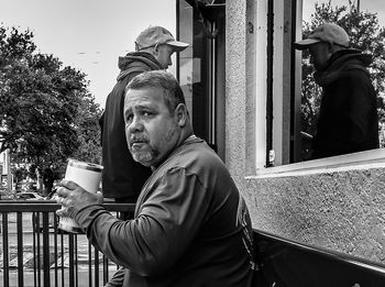 Man statue against building