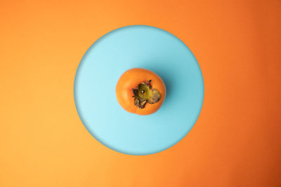 Directly above shot of orange fruit on table