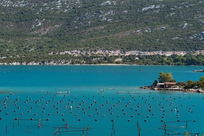 High angle view of sea and mountains