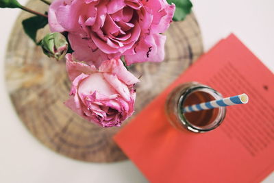 Close-up of pink flower vase on table