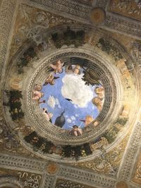 Low angle view of ornate ceiling