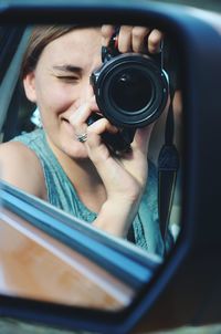 Portrait of man photographing