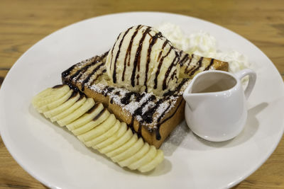 High angle view of cake in plate on table