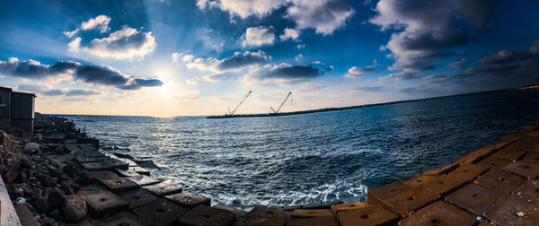 Panoramic view of sea against sky during sunset