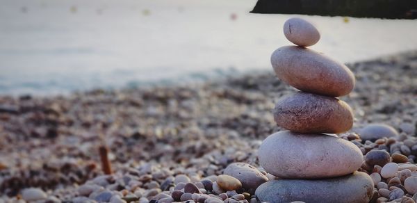 Close-up of stone stack on rock