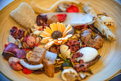 High angle view of fruits in plate on table