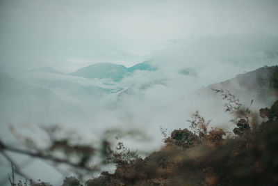 Scenic view of mountains against sky during winter