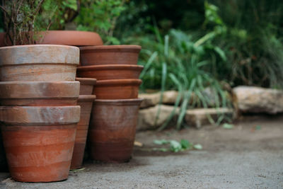 Stack of flower pots in yard