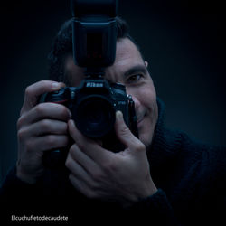 Portrait of man photographing