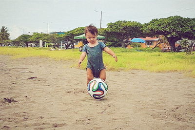 Boy playing with ball