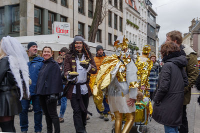 People standing on street in city