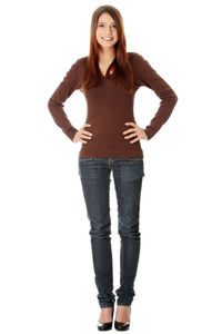 Portrait of a smiling young woman against white background