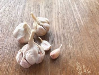 High angle view of garlic on table