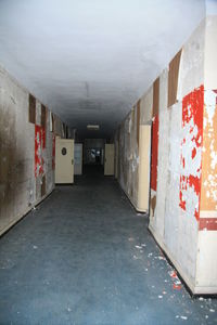 Empty alley against wall