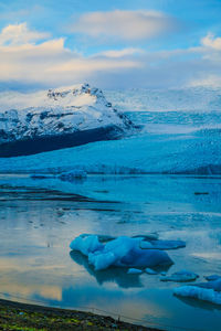 Scenic view of frozen sea against sky