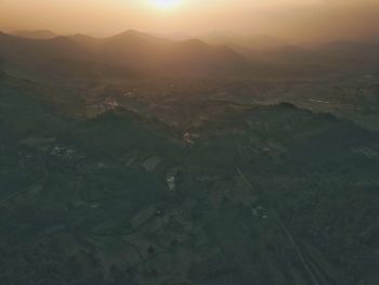 High angle view of landscape against sky during sunset